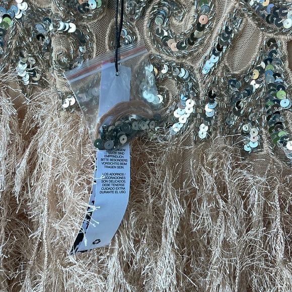 ASOS Edition sequin cutwork mini dress with faux feather hem. Size 6 - Picture 8 of 8